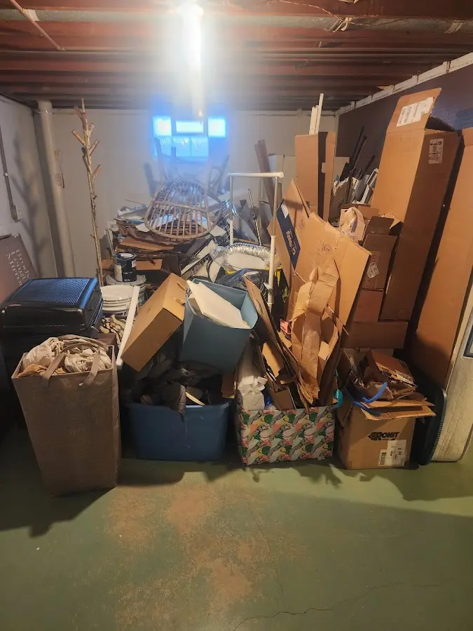 Roll-off dumpster container at job site for 2 Yard Dumpster Rental in Romeo